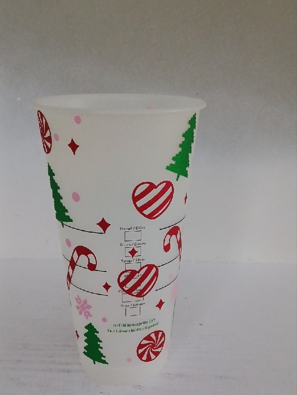 Starbucks White Plastic Holiday Cup with Green Logo and Pink & Red Accents - Picture 2 of 3